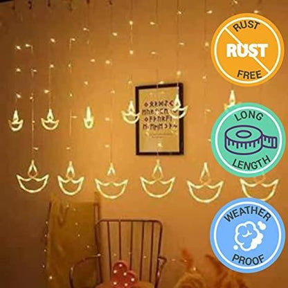 Warm White Diya/Diwali Light Curtain LED String Lights with 12 Hanging Diyas, 8 Flashing Modes, and Prong Base for Decoration